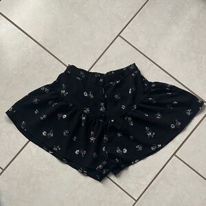 Francesca’s Floral Black Flowy Shorts with Button detail